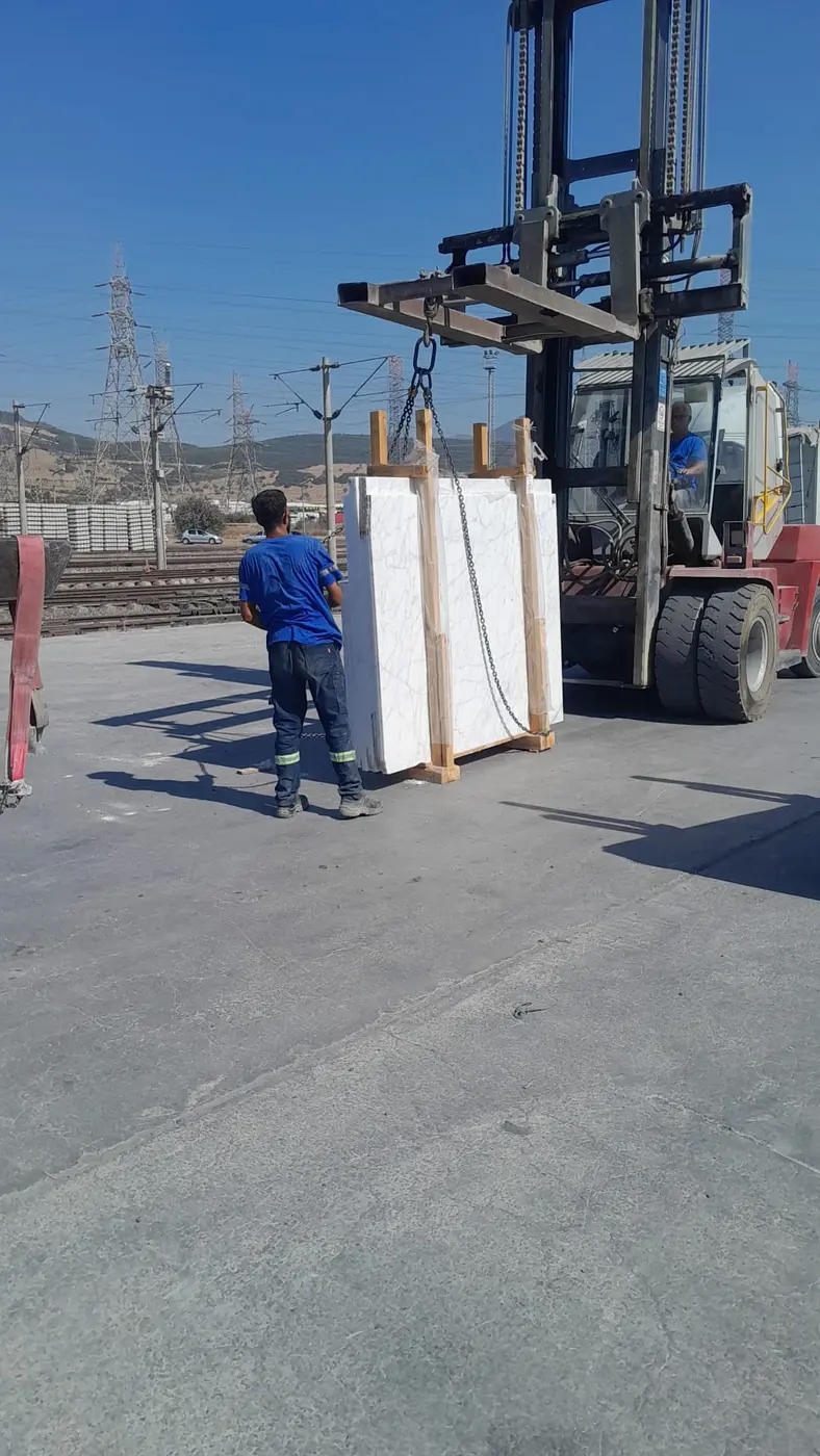 Natural stone crate being handled by forklift for shipment