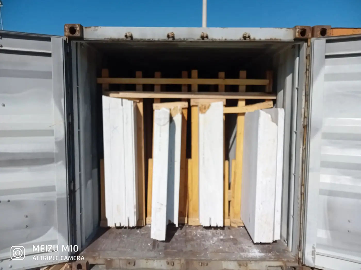Natural stone shipment prepared inside an open container