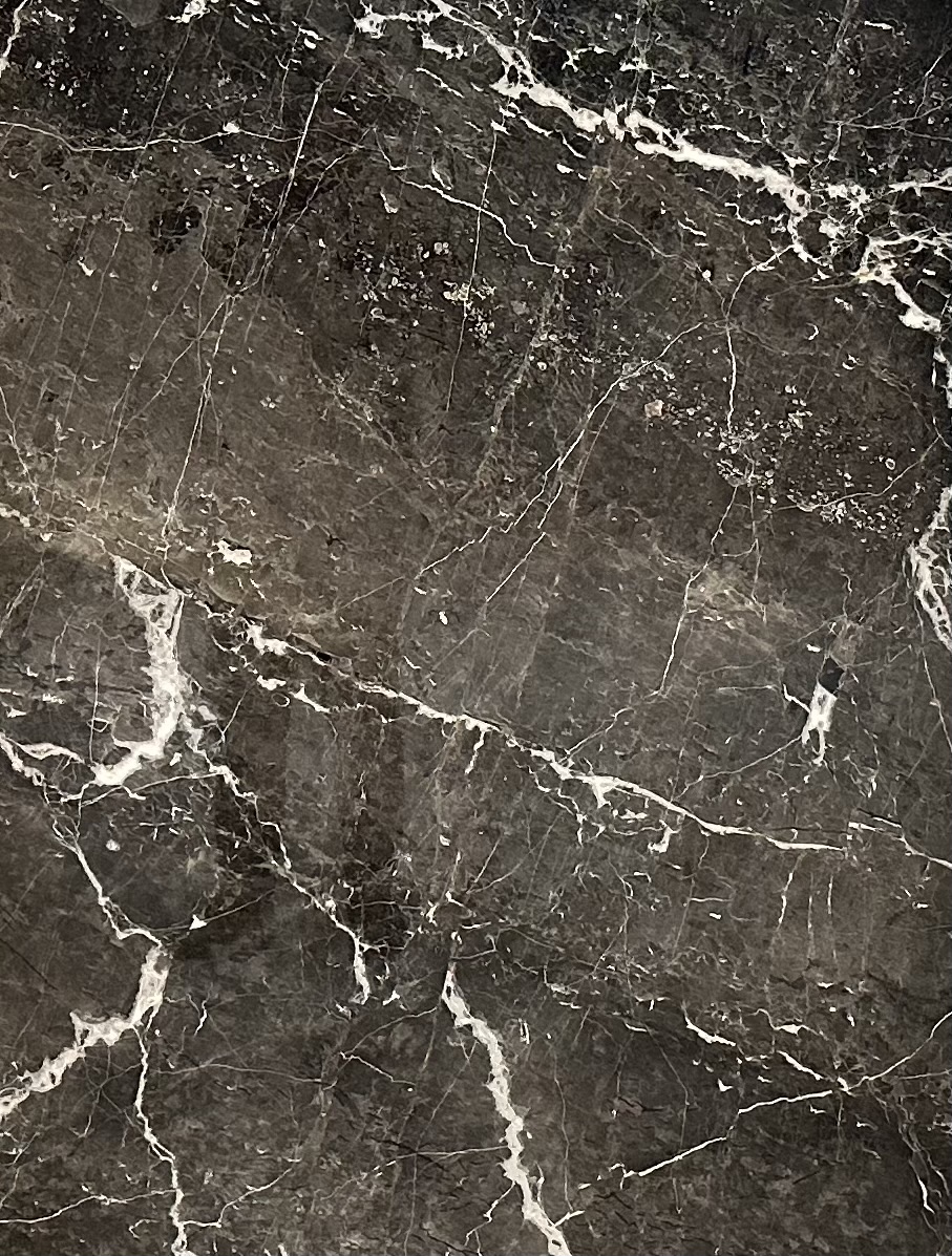 Nocturne Black natural stone texture with fine white veins